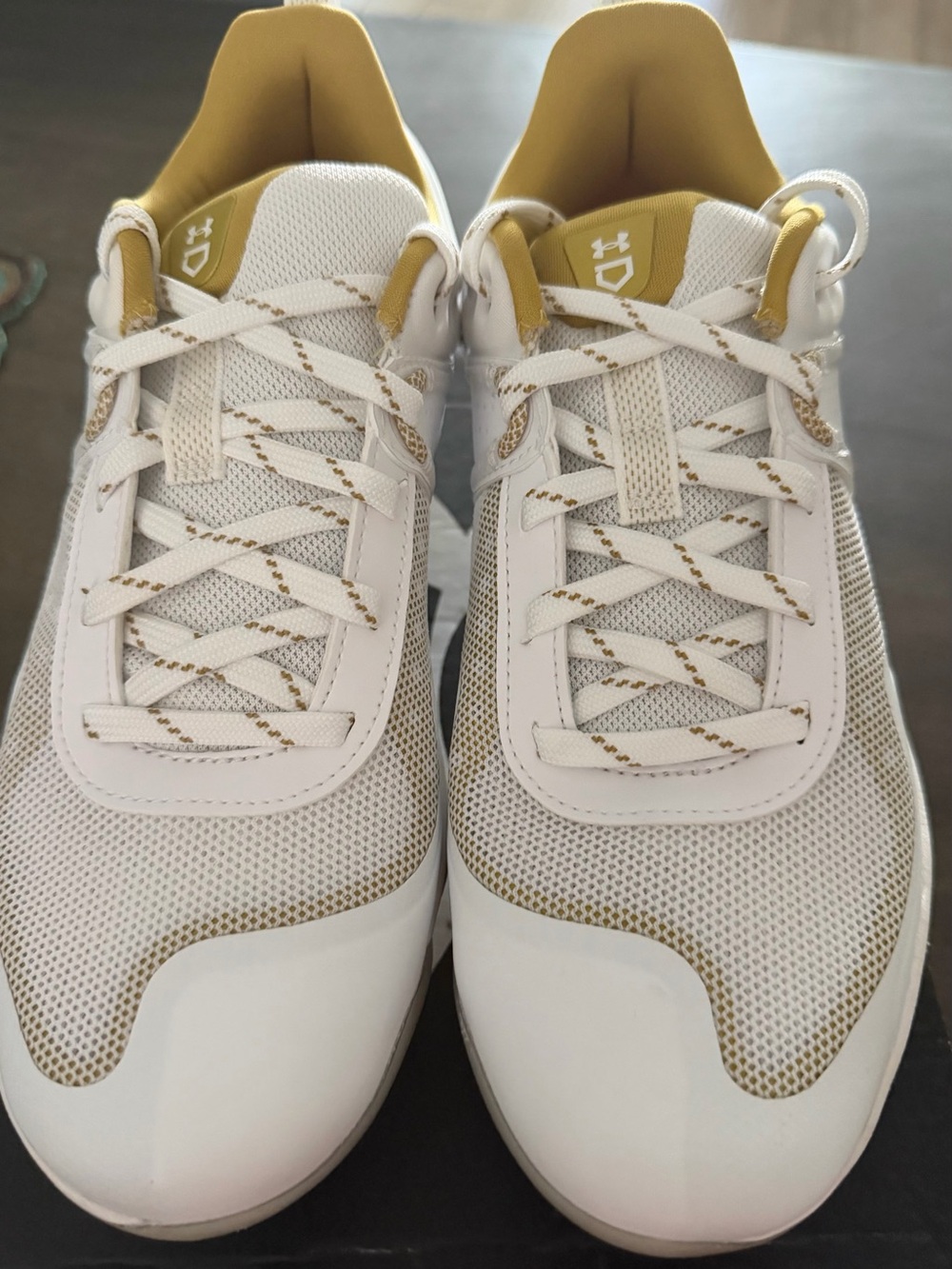 Under Armour Women’s White and Gold Softball Cleats - never worn